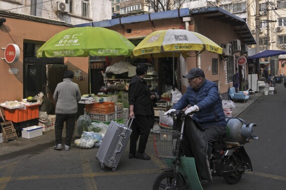 Stock market today: Asian stocks are mixed as week starts with uncertainty over tariffs