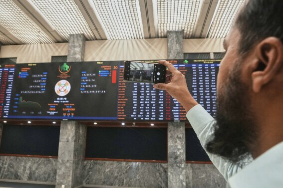 Mideast stock markets tumble as US tariffs and low oil prices squeeze energy-producing nations