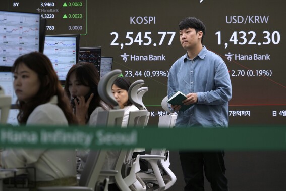 Asian shares soar after Wall Street rallies into a 3rd day