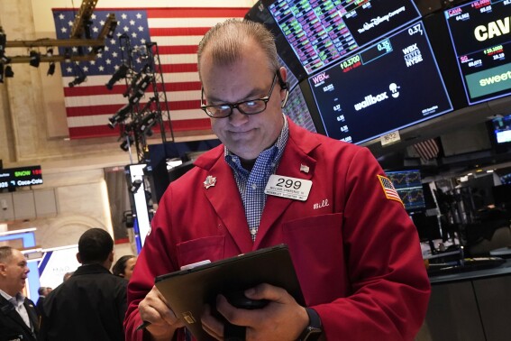 Asian shares rise after gains on Wall Street as corporate profits pile higher