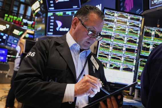 Asian shares are mostly lower after a mixed session on Wall Street