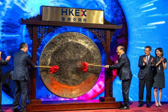 Asian shares advance after China cuts interest rates to boost economy