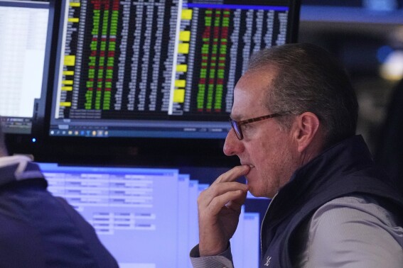 Asian shares slide while oil prices surge after Israel’s strike on Iran